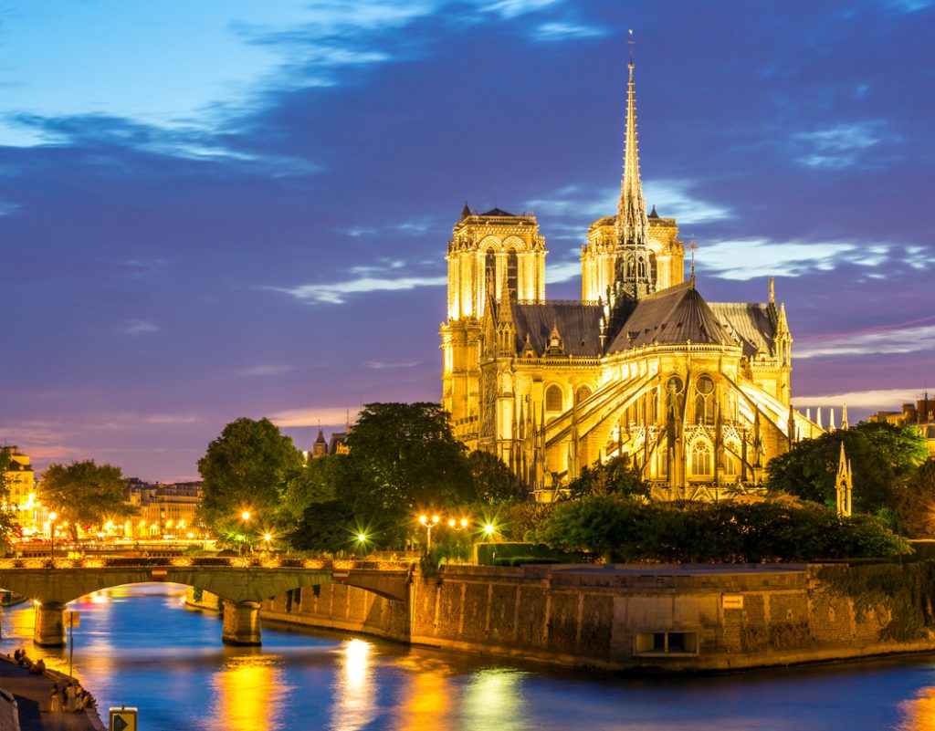 notre-dame de paris from behind on the river